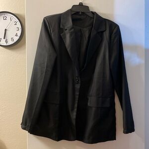 Blazer, black, size large, 100% poly. Lined, wash/dry, two functional pockets.